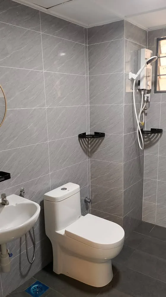 Grey tile toilet basin shower