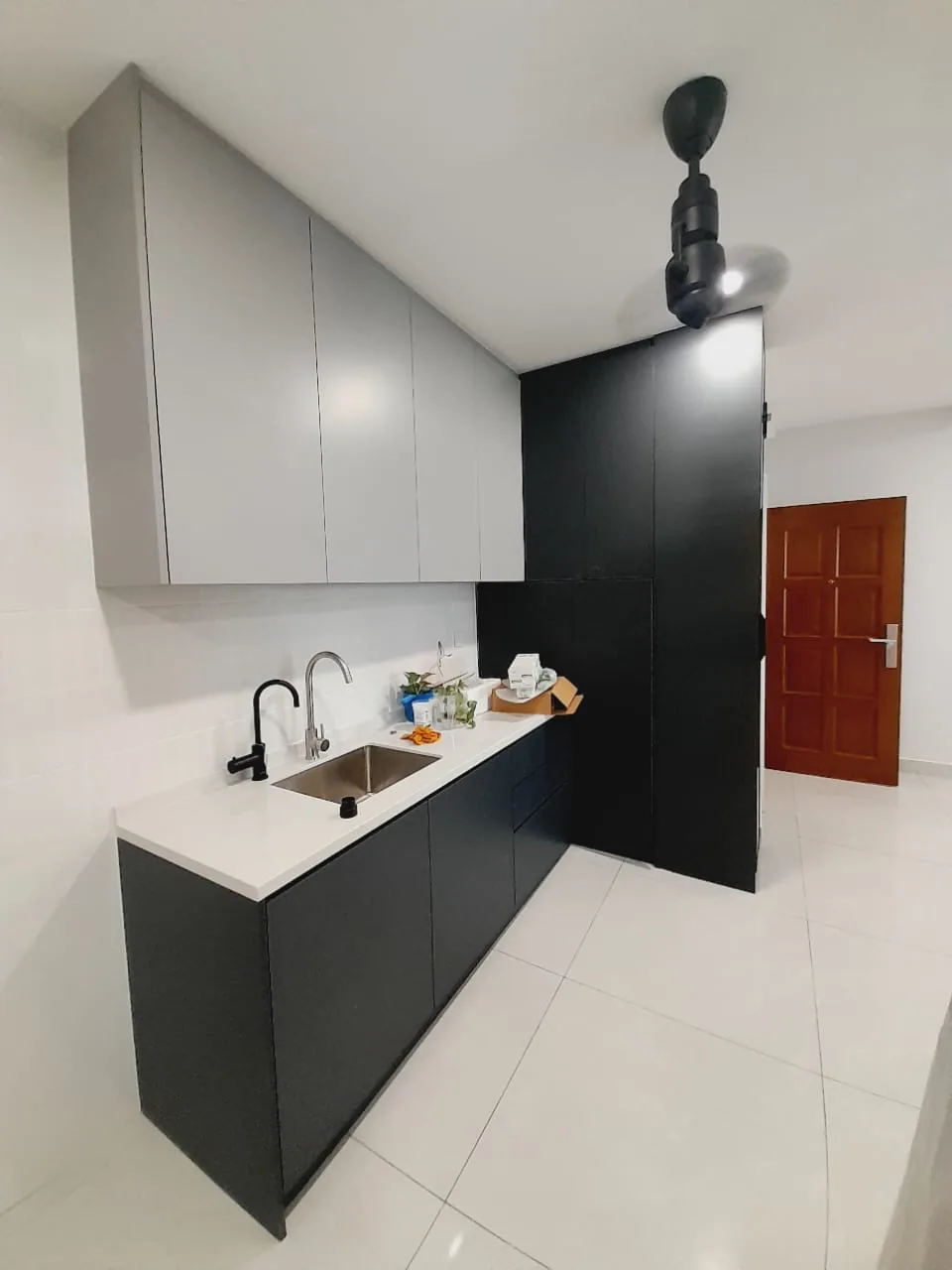 Black base cabinet white worktop