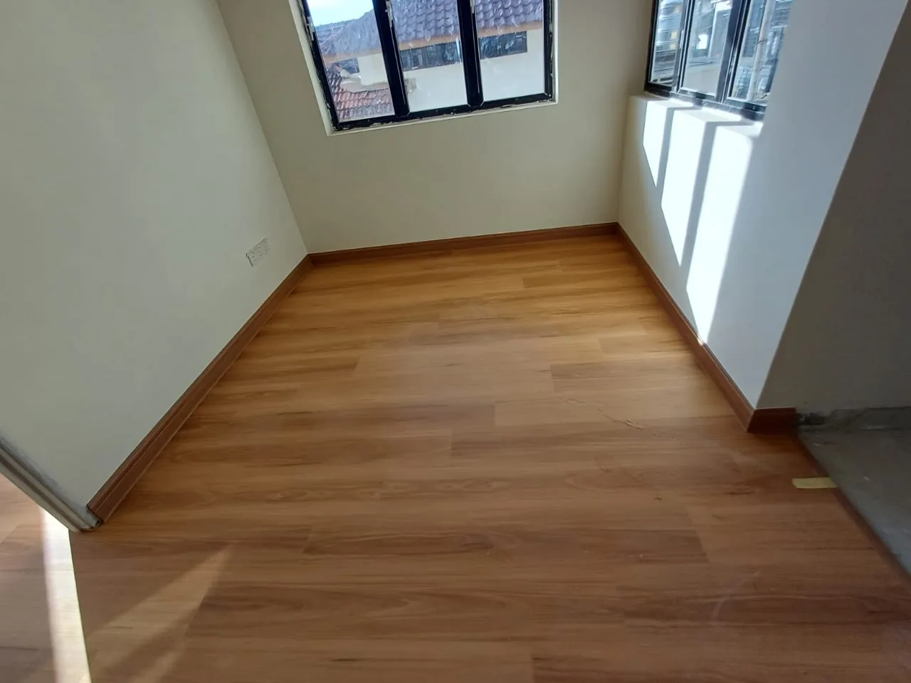 Process — Wood look floor corner window room